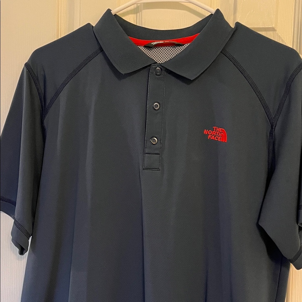 The North Face Men's Dark Blue Polo with Red Logo